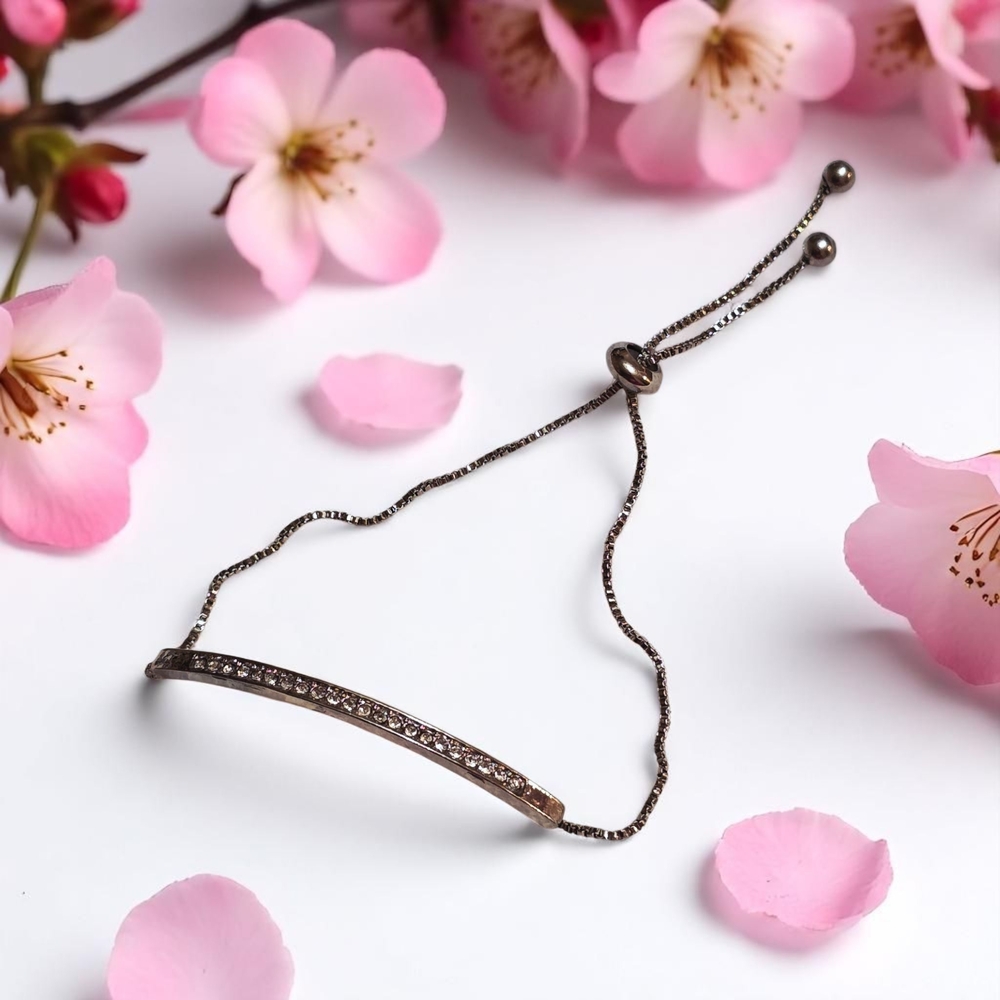 Elegant Silver Bolo Bracelet with Rhinestones Accents